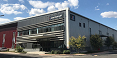 三木プーリ天津の外観（中国拠点として伝動機器・カップリング製品の製造および供給を担う工場建屋外観）